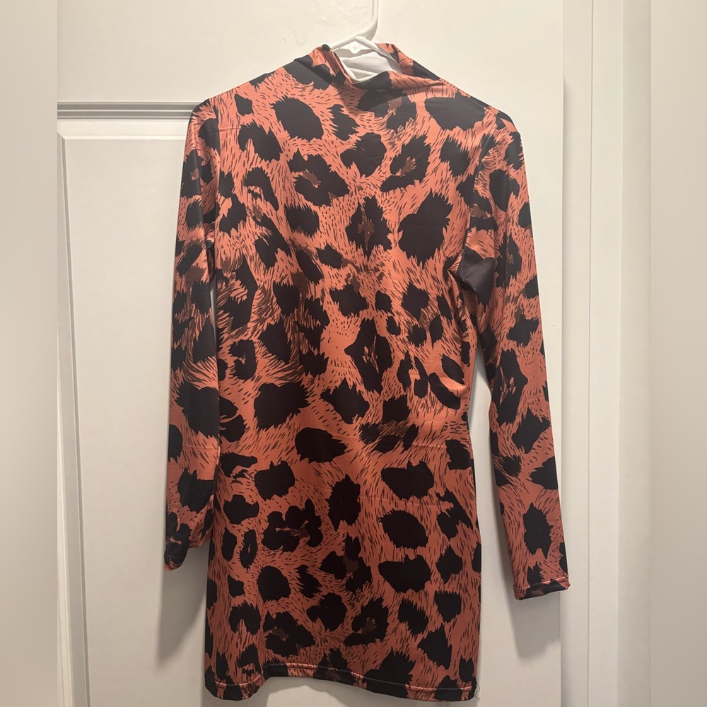 Leopard Print Long Sleeve Dress

Exact replica of Naked Wardobe dress